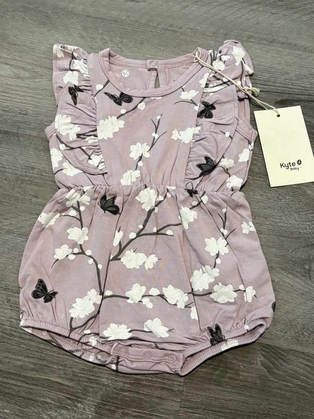 NEW Kyte BABY Mauve Floral & Butterfly Ruffle Romper 6-12 months cherry blossom